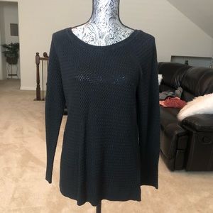 A soft, black sweater only worn once.